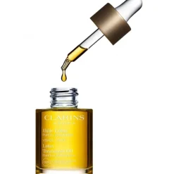 CLARINS Huile Lotus                Purifie, rééquilibre