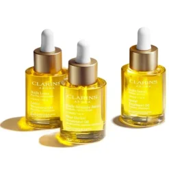 CLARINS Huile Santal                Apaise, nourrit
